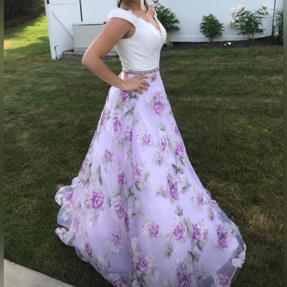 Clarisse size 8 prom dress. White appliqué top and full length floral bottom.
